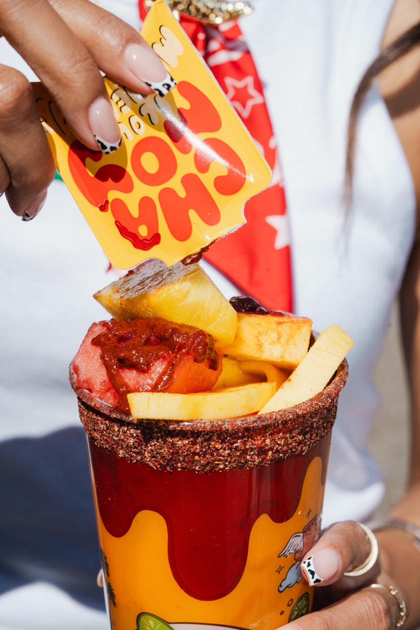 Fruit cup topped with i lov emicheladas chamoy